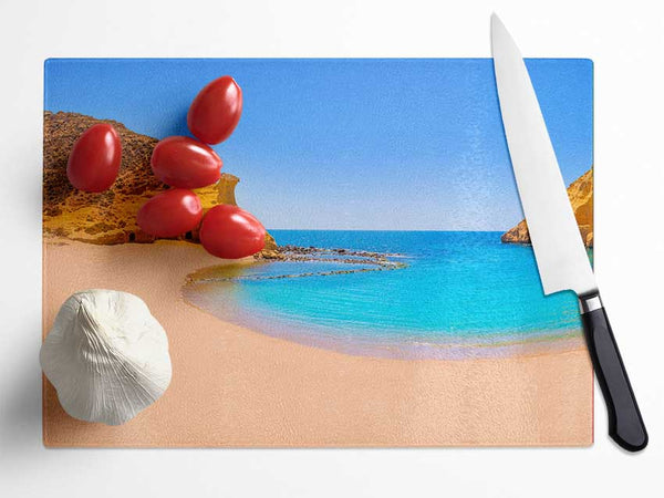 Beach cove blue seas Glass Chopping Board