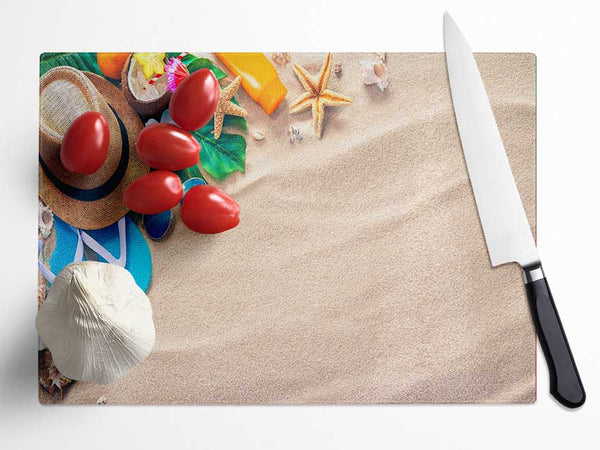 Sunglasses and hat on the beach Glass Chopping Board
