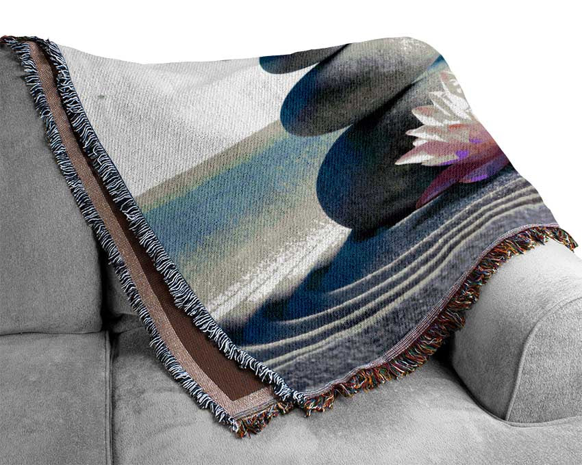pebbles on zen beach lilly Woven Blanket