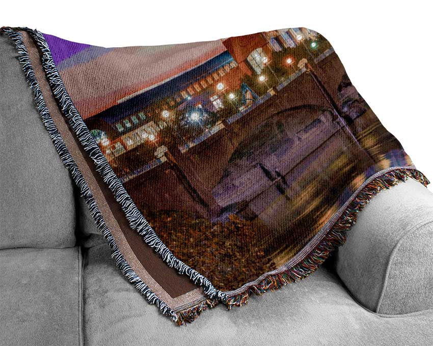 Bridge across the city at night Woven Blanket