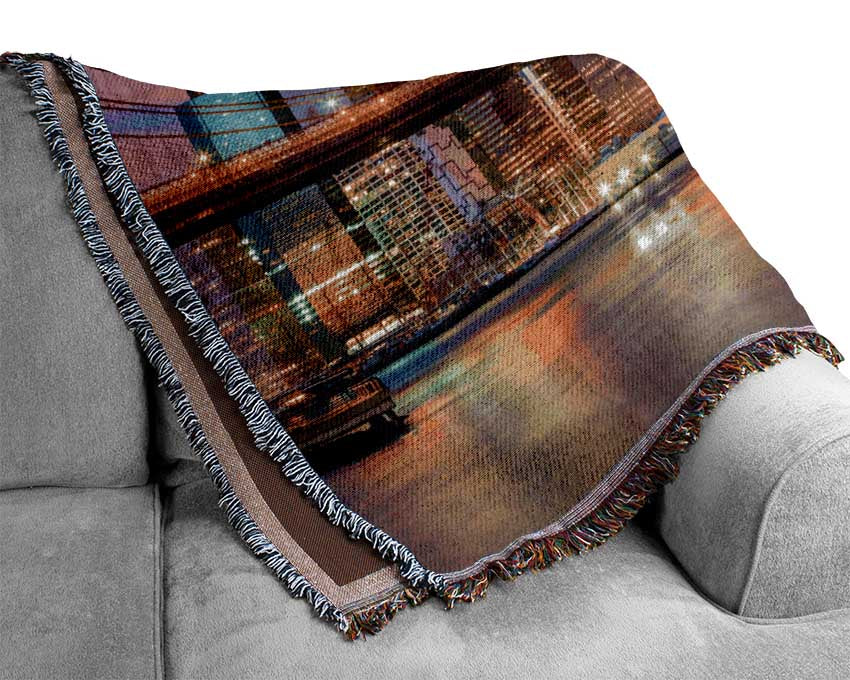 Light on a NYC bridge Woven Blanket