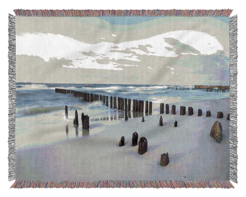 Rough seas on the beach Woven Blanket