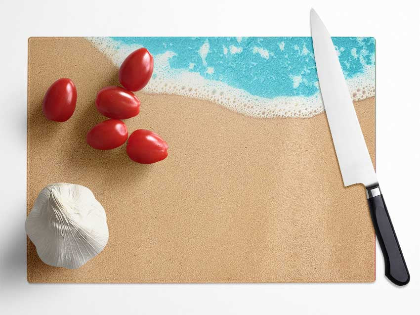 Sand and sea meet Glass Chopping Board