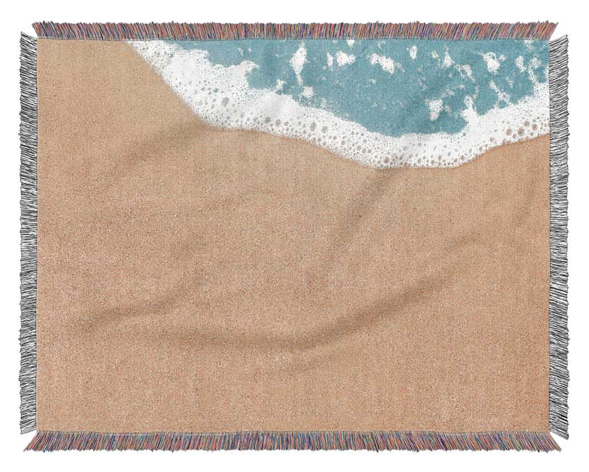 Sand and sea meet Woven Blanket