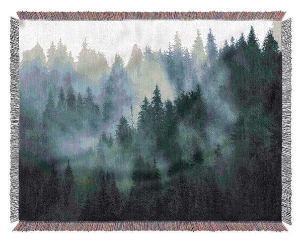 Mist in the dense woods Woven Blanket