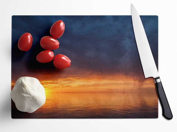 Storms arriving over the sunset Glass Chopping Board