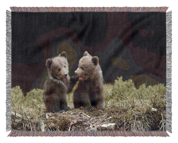 Two bear cubs playing Woven Blanket