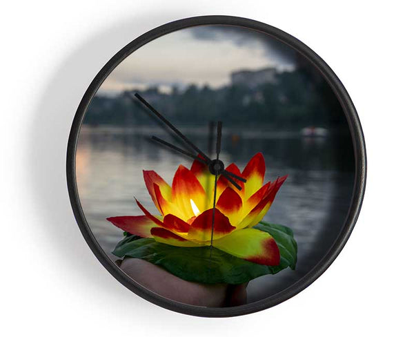 Flower candle in city view Clock - Wallart-Direct UK