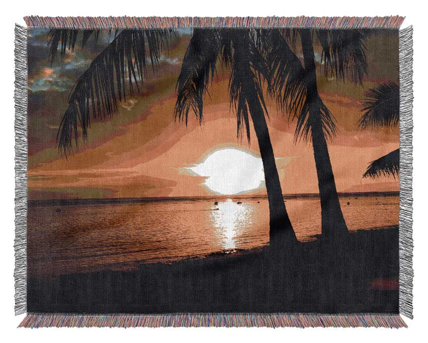 Watching the sunset in paradise Woven Blanket