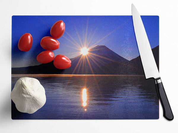 Sunset over the mountain dusk Glass Chopping Board