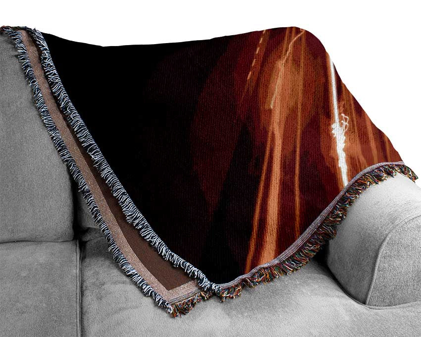 Electric lights on the highland Woven Blanket