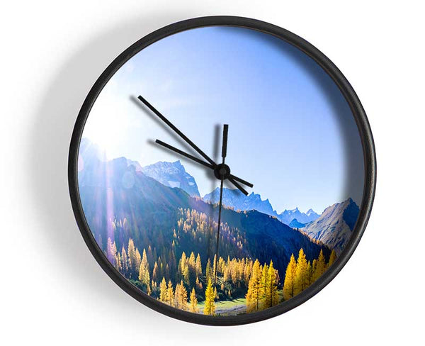 Mountain view of tall trees sunrise Clock - Wallart-Direct UK