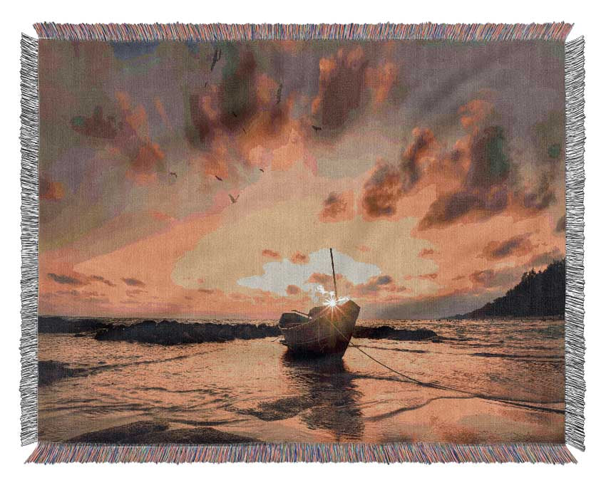 Sunset finishing boat on the beach Woven Blanket