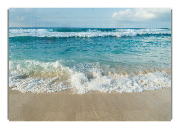 Crashing waves on the sandy beach