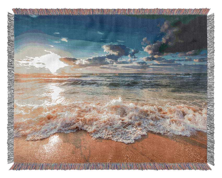 splashing waves on the beach Woven Blanket