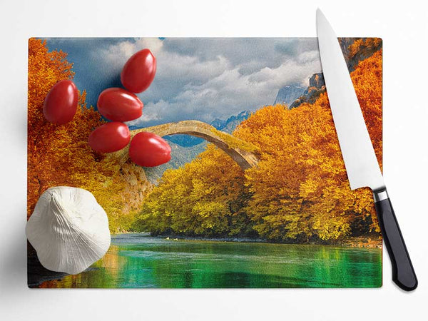 bridge over the autumn lake Glass Chopping Board