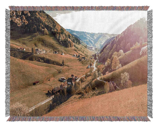 The village in the valley Woven Blanket