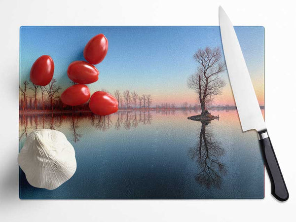 Ice cold trees in the river Glass Chopping Board