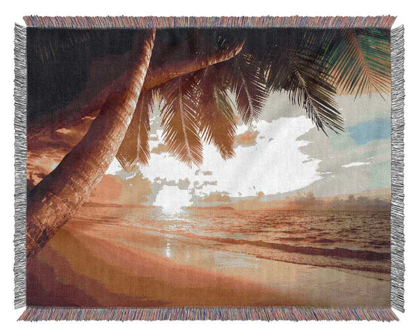 Low sunset at the beach Woven Blanket