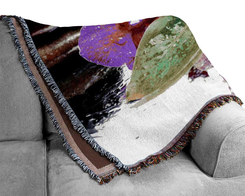 Orchids on the wet pebbles Woven Blanket
