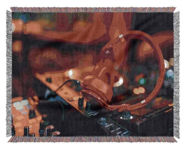 Red headphones on mixing desk Woven Blanket