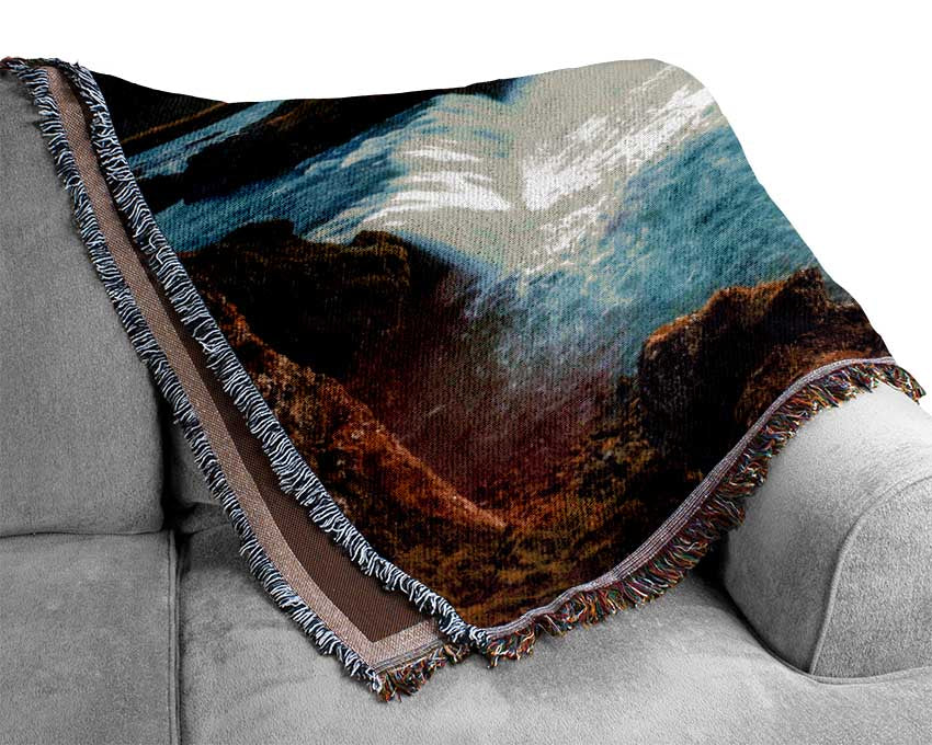 Waterfalls emptied into the sea Woven Blanket