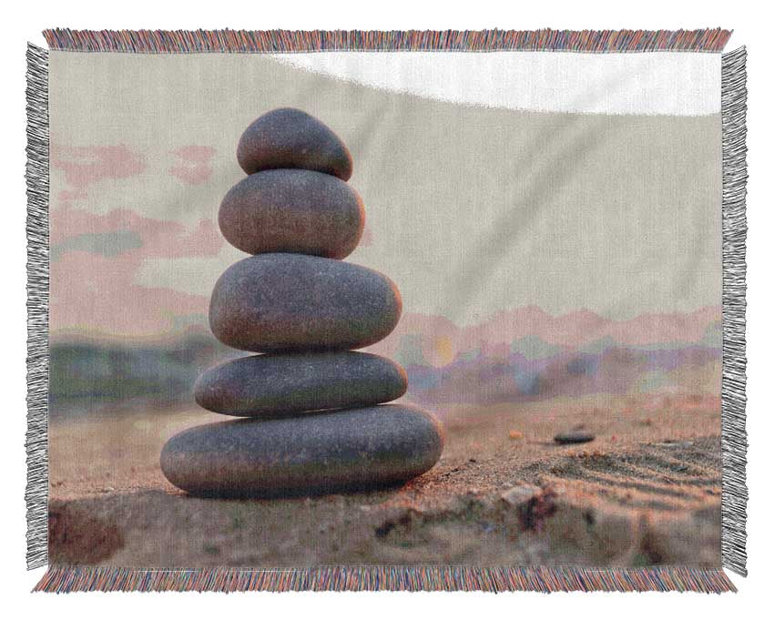 Zen stones stacked up on beach Woven Blanket