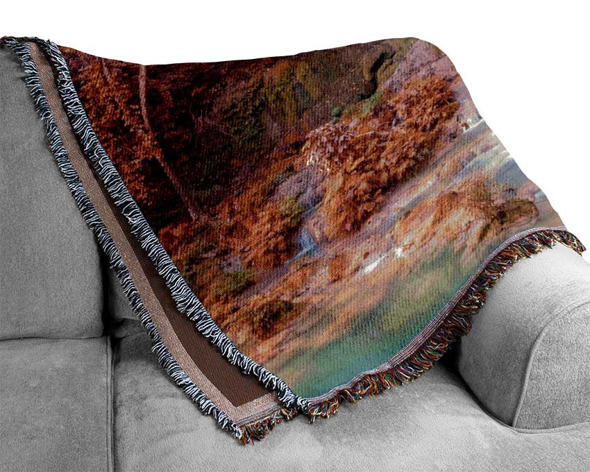 Rainbow waterfall woods Woven Blanket