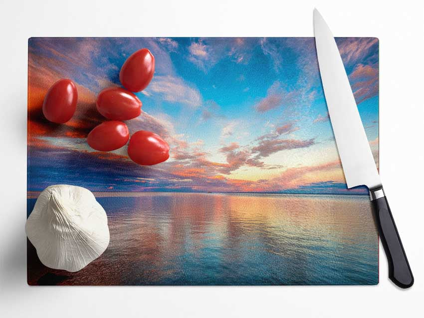 Stunning skies above the sea Glass Chopping Board