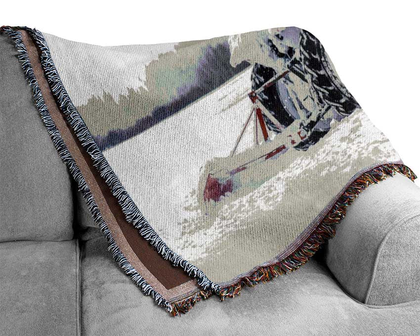 Tractor in the snow Woven Blanket