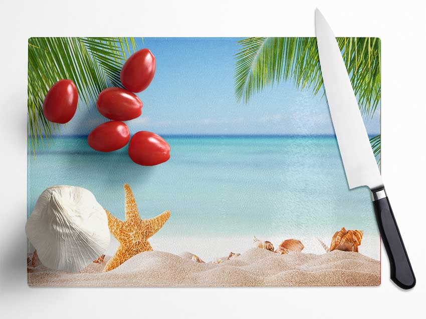 Starfish on the beach scene Glass Chopping Board