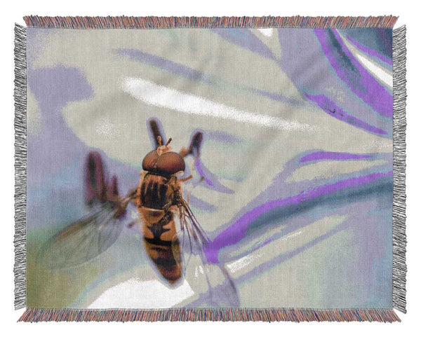 Hover fly on a purple flower Woven Blanket