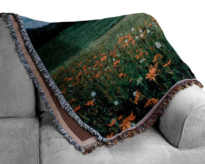Spring meadow between the trees Woven Blanket