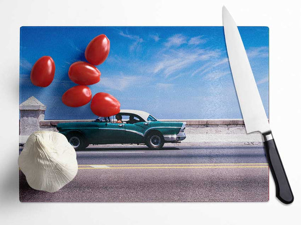 Classic car down the highway Glass Chopping Board
