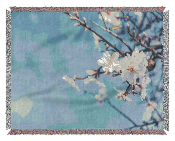 White blossom flowers  off a branch Woven Blanket