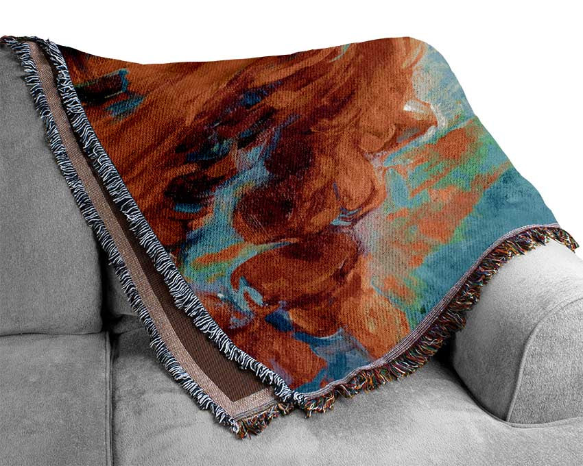 Row boat on the horizon of colour Woven Blanket