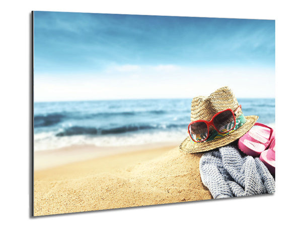Sun hat and sunglasses on the beach Metal Print