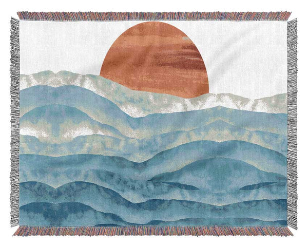 Red Sun Over The Ripples Woven Blanket