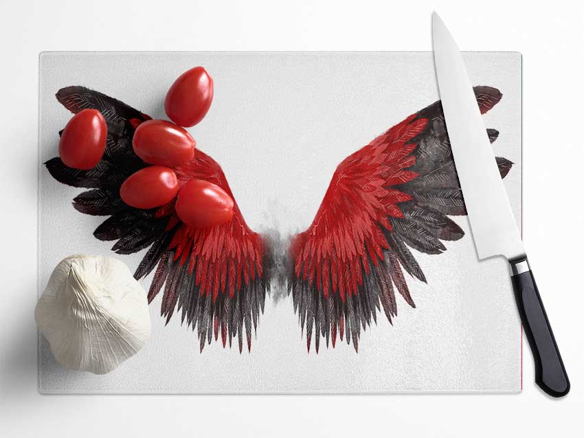 The Read Feathers Of A Bird Glass Chopping Board