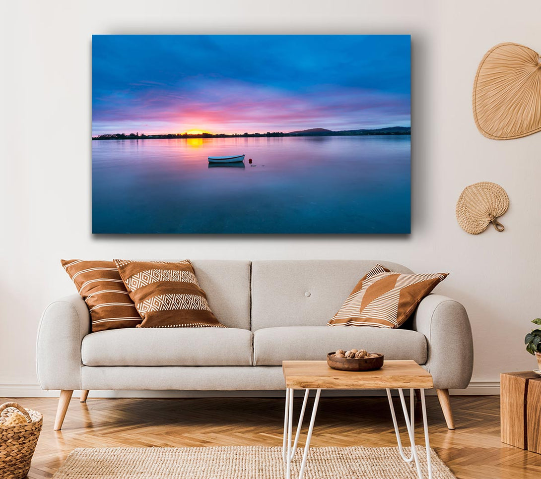 Picture of Small row boat on calm lake Canvas Print Wall Art