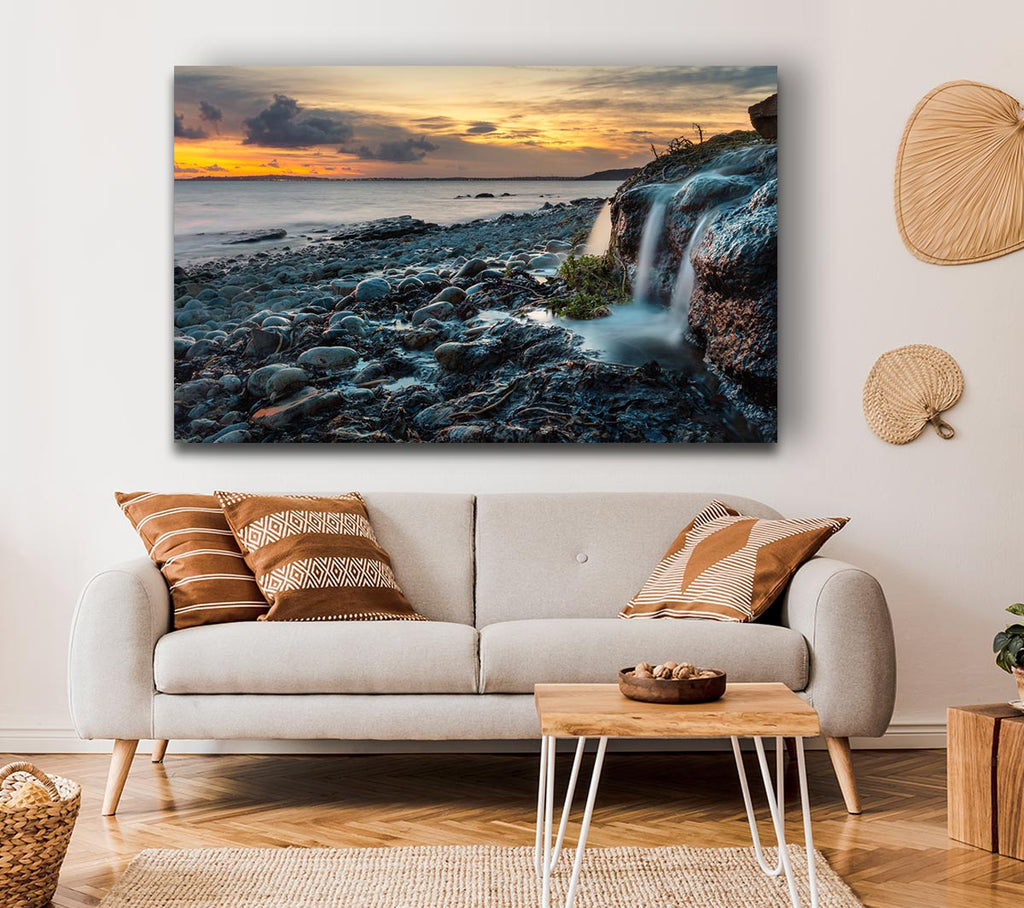 Picture of Water flows down the rocks into the sea Canvas Print Wall Art