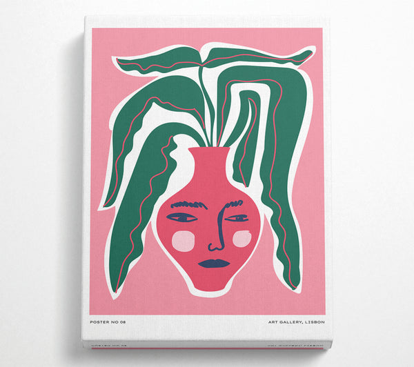 Grüne Blätter in einer rosa Vase